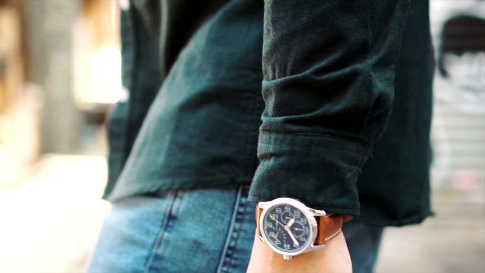 The same watch on the street, brown leather, worn with denim and a work jacket.